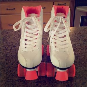 Pink and white roller skates